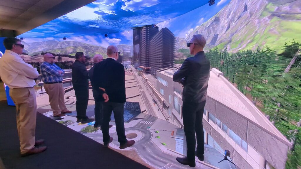 Advanced, immersive visualization environment
people standing in an immersive CAVE created by Mechdyne